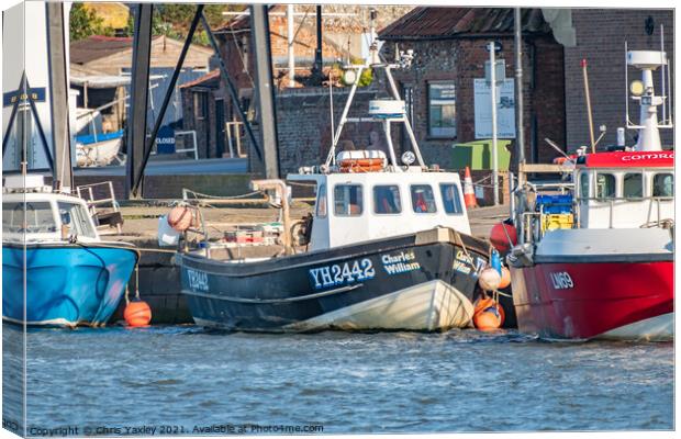 Commercial fishing boats in the port of Wells-Next-The-Sea, North Norfolk Canvas Print by Chris Yaxley