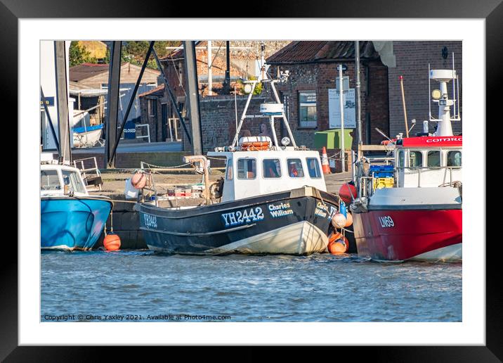 Commercial fishing boats in the port of Wells-Next-The-Sea, North Norfolk Framed Mounted Print by Chris Yaxley