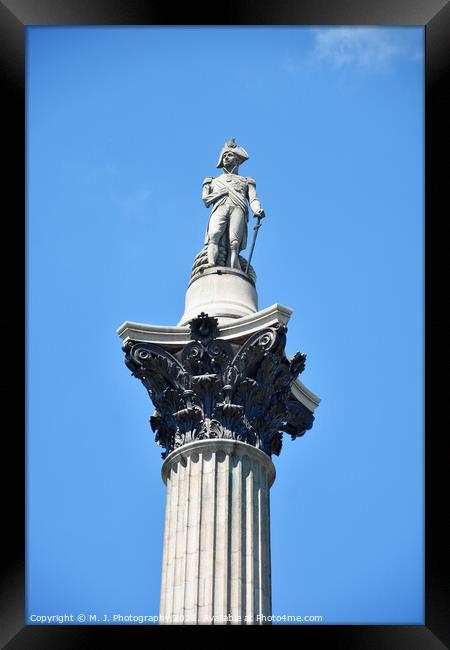 The statue of Admiral Nelson that sits ontop of Nelson's Column  Framed Print by M. J. Photography