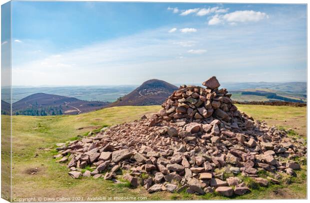 Rock pile at the top of Eildon Hill North looking towards Eildon Mid Hill and Eildon Wester Hill Canvas Print by Dave Collins
