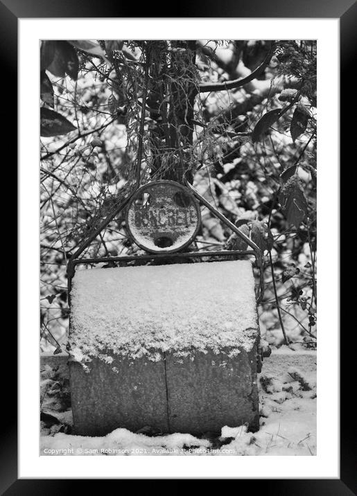 Snow covered garden roller Framed Mounted Print by Sam Robinson
