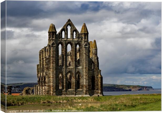 Majestic Ruins Overlooking Whitby Bay Canvas Print by Janet Carmichael