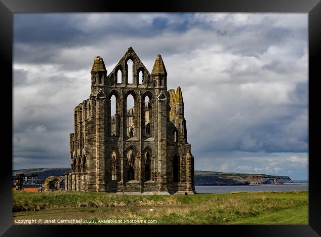 Majestic Ruins Overlooking Whitby Bay Framed Print by Janet Carmichael