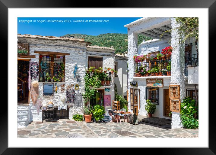Souvenir shops in Pampaneira in Andalusia, Spain Framed Mounted Print by Angus McComiskey