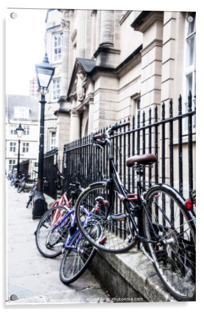 Bikes Chained Up Against Railings Outside Oxford University Coll Acrylic by Peter Greenway