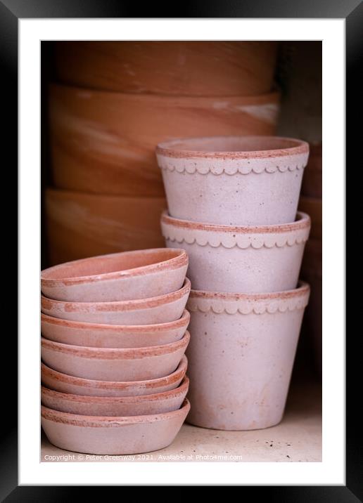 Pile Of Terracotta Flower Pots On A Shelf Framed Mounted Print by Peter Greenway