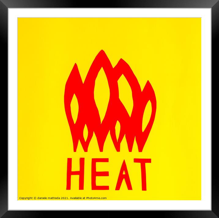 the writing heat with flames Framed Mounted Print by daniele mattioda