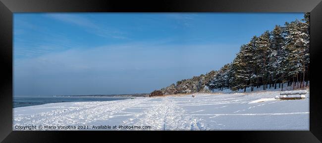 Panoramic view of snowy sea coast Framed Print by Maria Vonotna