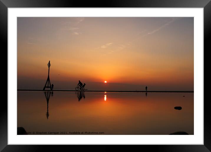 Cycling sunset Framed Mounted Print by Stephen Carrigan