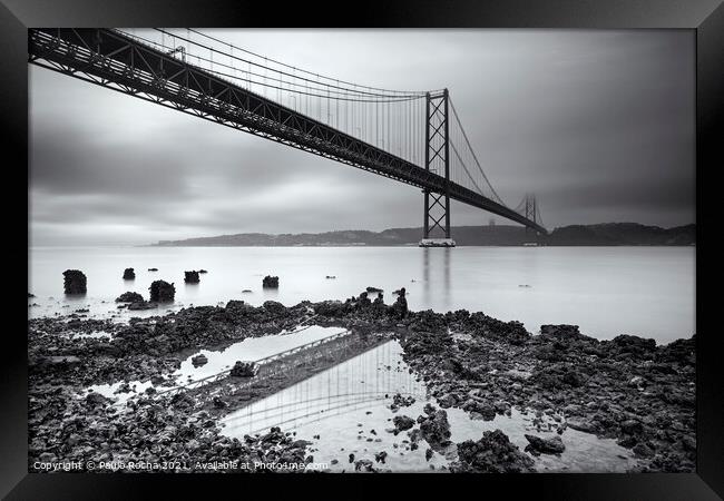 The 25th of April (25 de Abril) suspension bridge over Tagus river in Lisbon Framed Print by Paulo Rocha