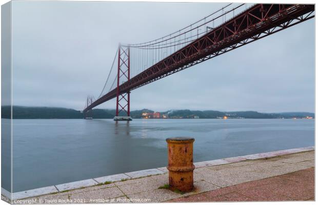The 25th of April (25 de Abril) suspension bridge over Tagus river in Lisbon Canvas Print by Paulo Rocha