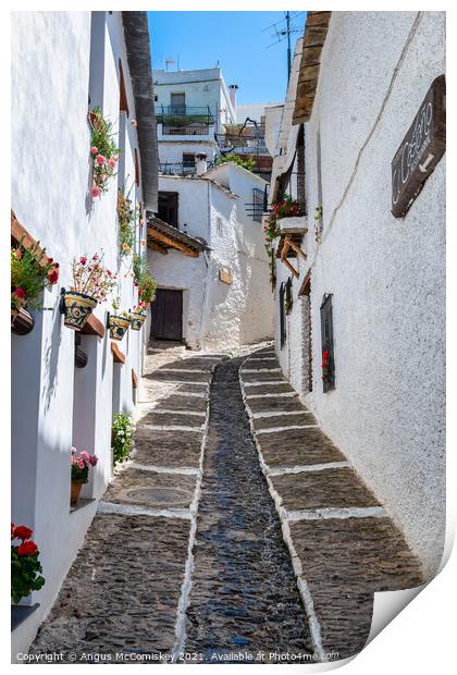 Narrow alleyway in Pampaneira, Andalusia, Spain Print by Angus McComiskey