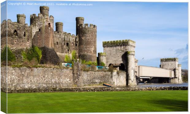 Train Passing Conwy Castle Wales Canvas Print by Pearl Bucknall