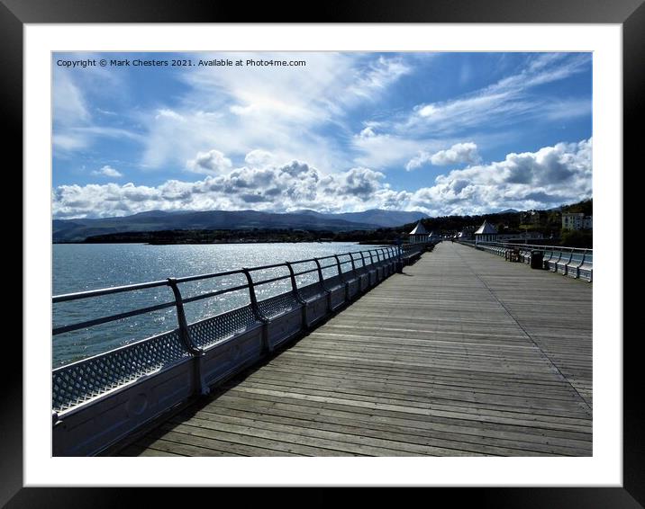 Bangor pier looking towards Snowdonia. Framed Mounted Print by Mark Chesters