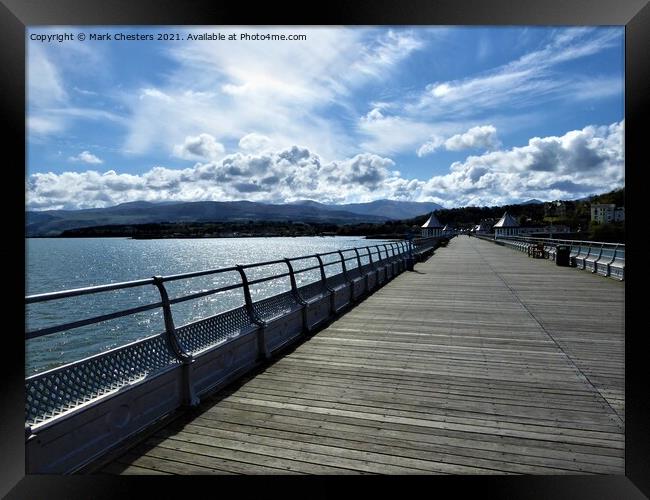 Bangor pier looking towards Snowdonia. Framed Print by Mark Chesters