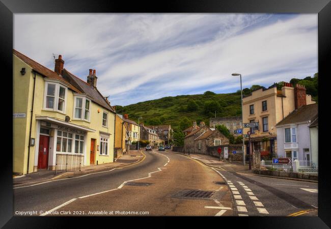 Charming Village with a Painterly Sky Framed Print by Nicola Clark