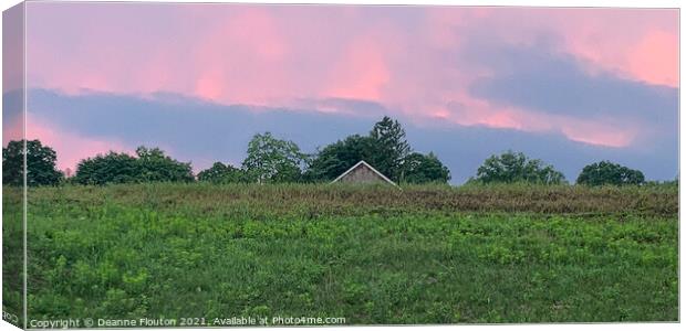 Roof amidst Peak Pink Clouds Canvas Print by Deanne Flouton