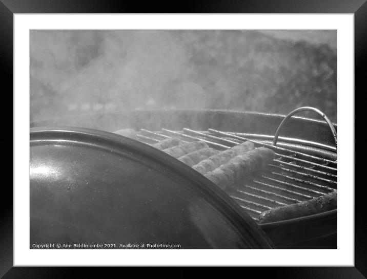 sausages on a barbecue in monochrome Framed Mounted Print by Ann Biddlecombe