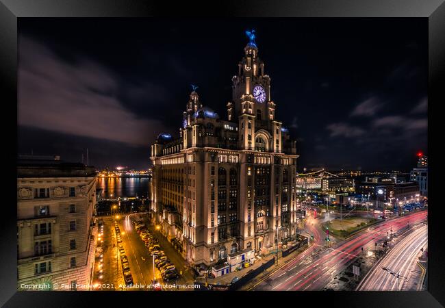 Dramatic shot of the Royal Liver Building and the Liverpool skyl Framed Print by Paul Hanley