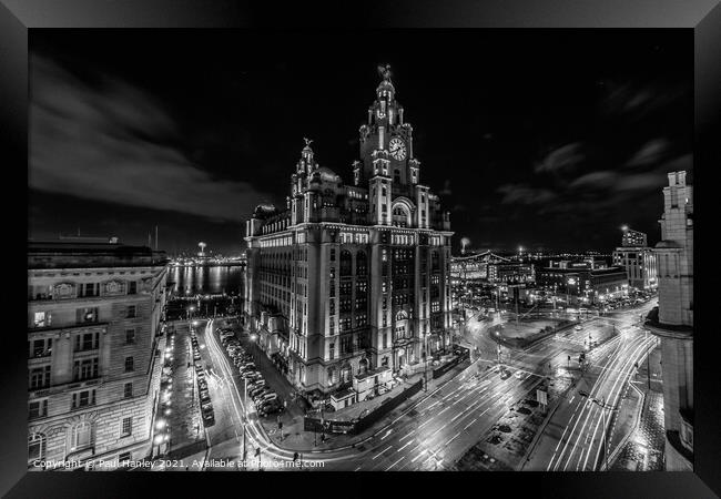 Dramatic shot of the Royal Liver Building and the Liverpool skyl Framed Print by Paul Hanley