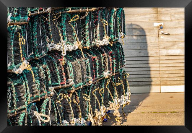 Crab pots and lobster traps on Well-Next-The-Sea quay Framed Print by Chris Yaxley