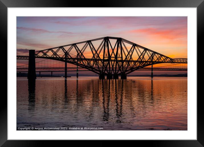 Paddle boarders under the Forth Rail Bridge Framed Mounted Print by Angus McComiskey