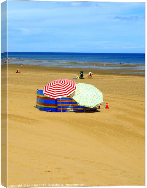 Parasol party at Mablethorpe in Lincolnshire Canvas Print by john hill