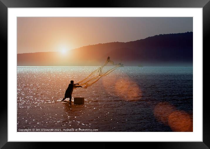 A Thai fisherman at sunrise Framed Mounted Print by Jim O'Donnell