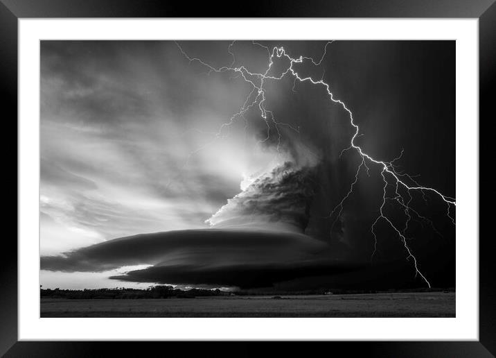 The Dark Side of the Storm.  Framed Mounted Print by John Finney