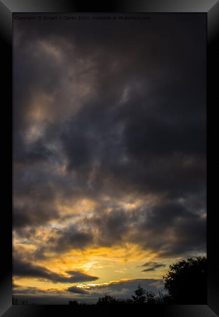 Stormy sunset Framed Print by Stuart C Clarke
