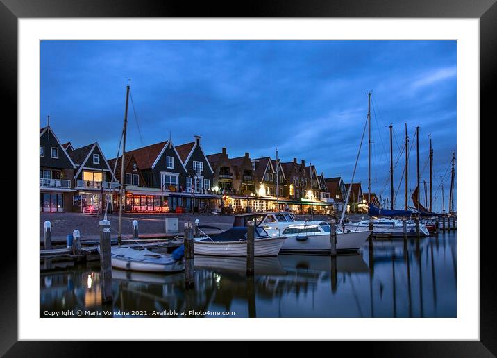 Traditional fishing town night scene Framed Mounted Print by Maria Vonotna