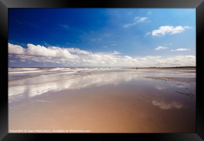 Sand and Sea reflections of the beautiful clouds a Framed Print by That Foto