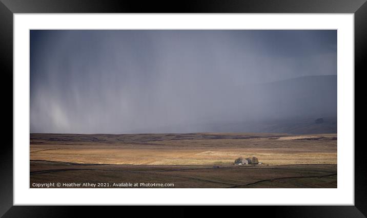Snow shower above Rotherhope moor Framed Mounted Print by Heather Athey
