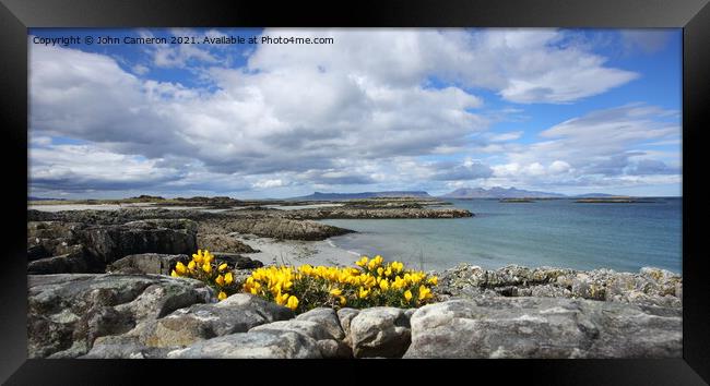 Isles of Eigg and Rum from Traigh in Arisaig. Framed Print by John Cameron