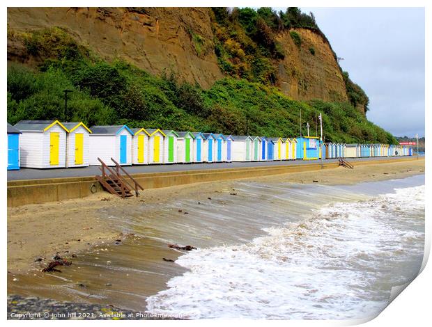 Beach huts on Hope beach at Shanklin on the IOW. Print by john hill