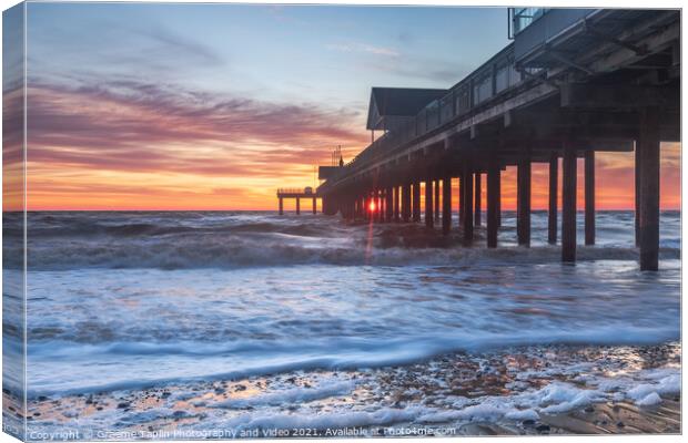 Southwold pier at sunrise on the Suffolk coast Canvas Print by Graeme Taplin Landscape Photography