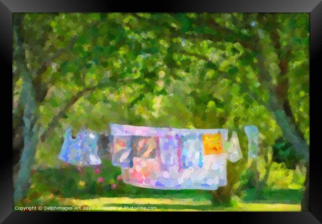 Laundry hanging in a garden in summer Framed Print by Delphimages Art