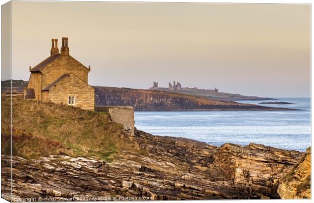 The Bathing House and Dunstanburgh Castle Canvas Print by Heidi Stewart