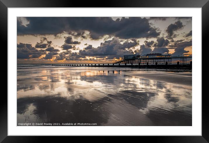 Sunrise Reflections on Cromer Beach North Norfolk  Framed Mounted Print by David Powley