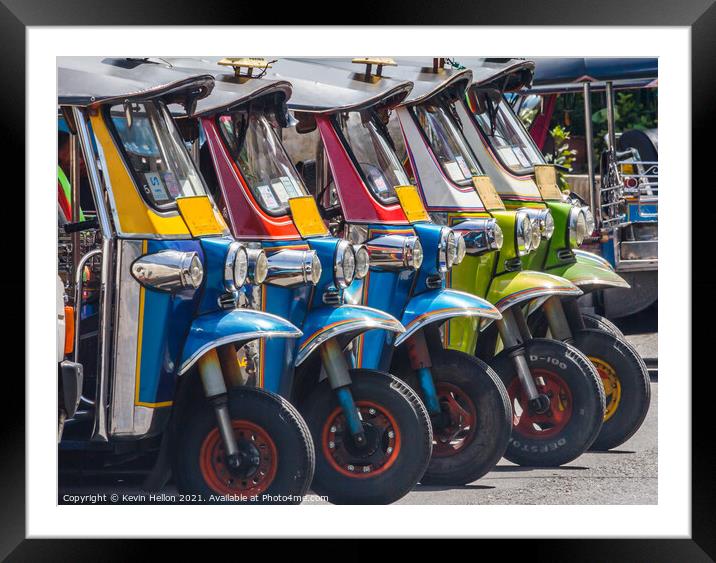 Tuk-tuks lined up in a row, Framed Mounted Print by Kevin Hellon