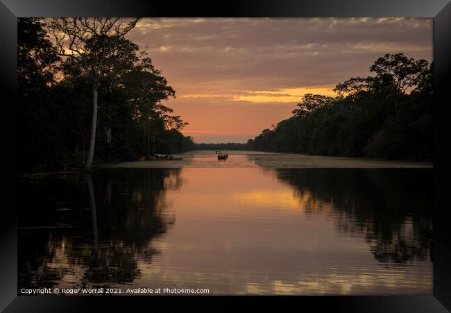 Sunset Angkor Cambodia Framed Print by Roger Worrall