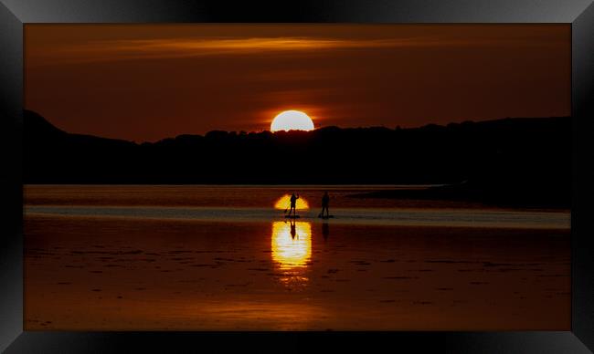 Paddle Boarders Sunset Framed Print by Danny Nee