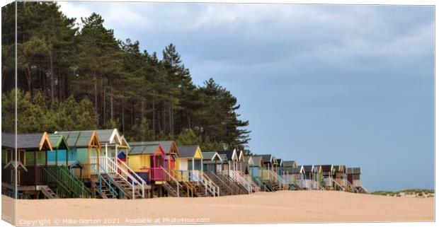 Vibrant Beach Huts in Wells-next-the-Sea Canvas Print by Mike Gorton