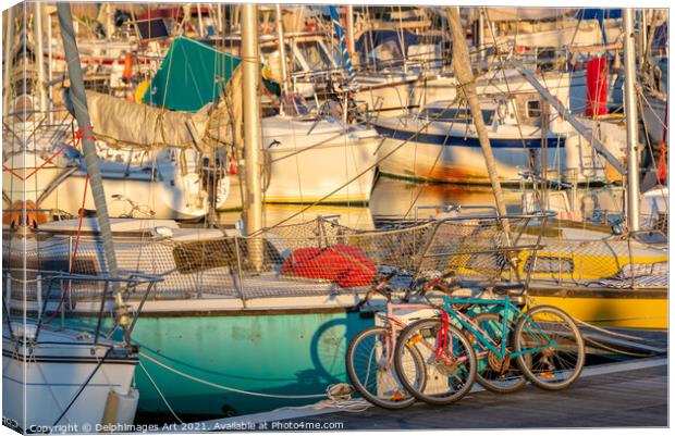 Cycling and sailing. Colourful bicycles and boats Canvas Print by Delphimages Art