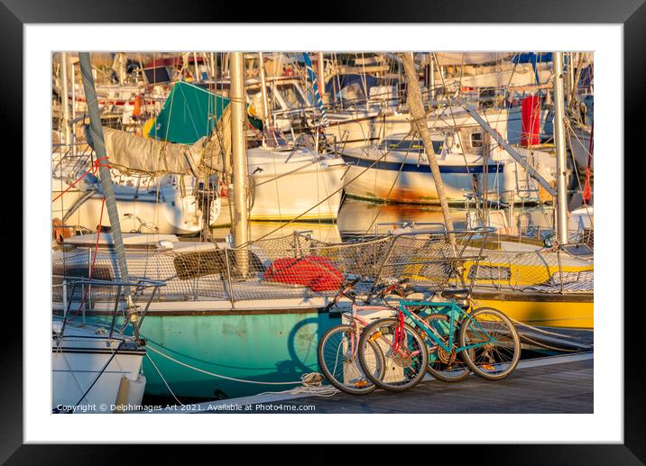 Cycling and sailing. Colourful bicycles and boats Framed Mounted Print by Delphimages Art