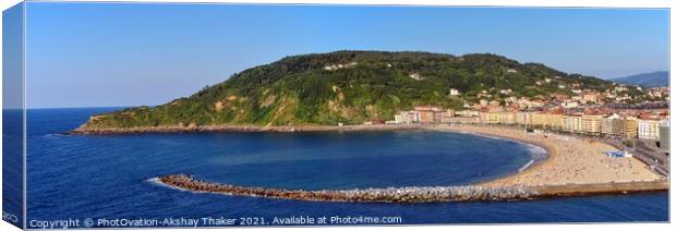 Panoramic view of pristine golden beach, ocean and lush green hills. Canvas Print by PhotOvation-Akshay Thaker