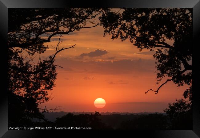 Sunset Framed Print by Nigel Wilkins