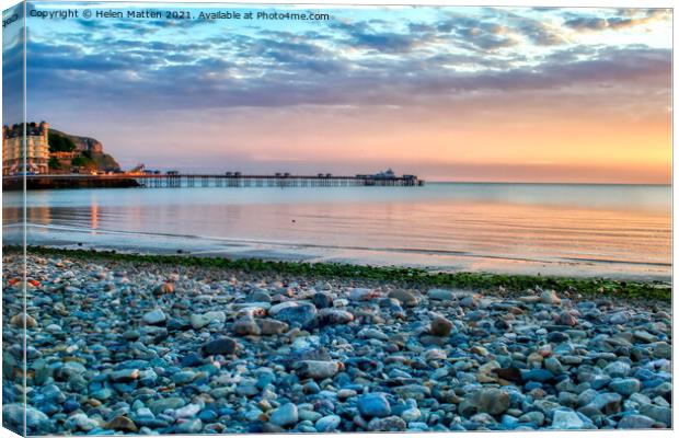 Dawn on LLandudno Beach and pier Canvas Print by Helkoryo Photography