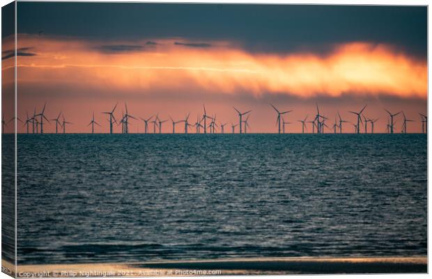 Sunset over the turbines Canvas Print by Philip Nightingale