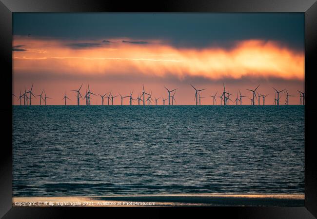 Sunset over the turbines Framed Print by Philip Nightingale
